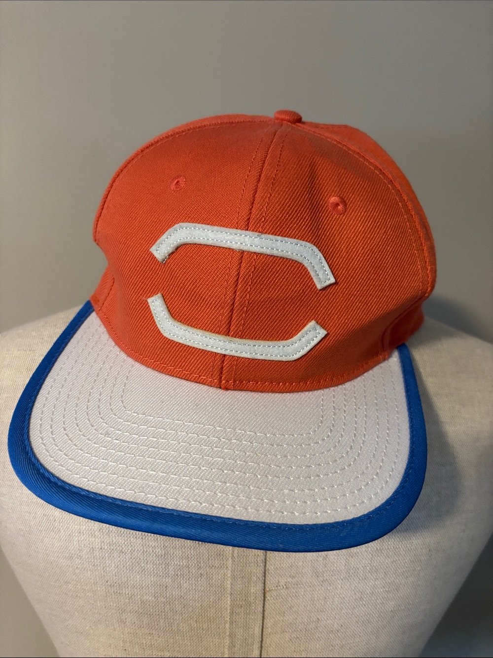 Pokemon Orange and White Cap with Blue Trim